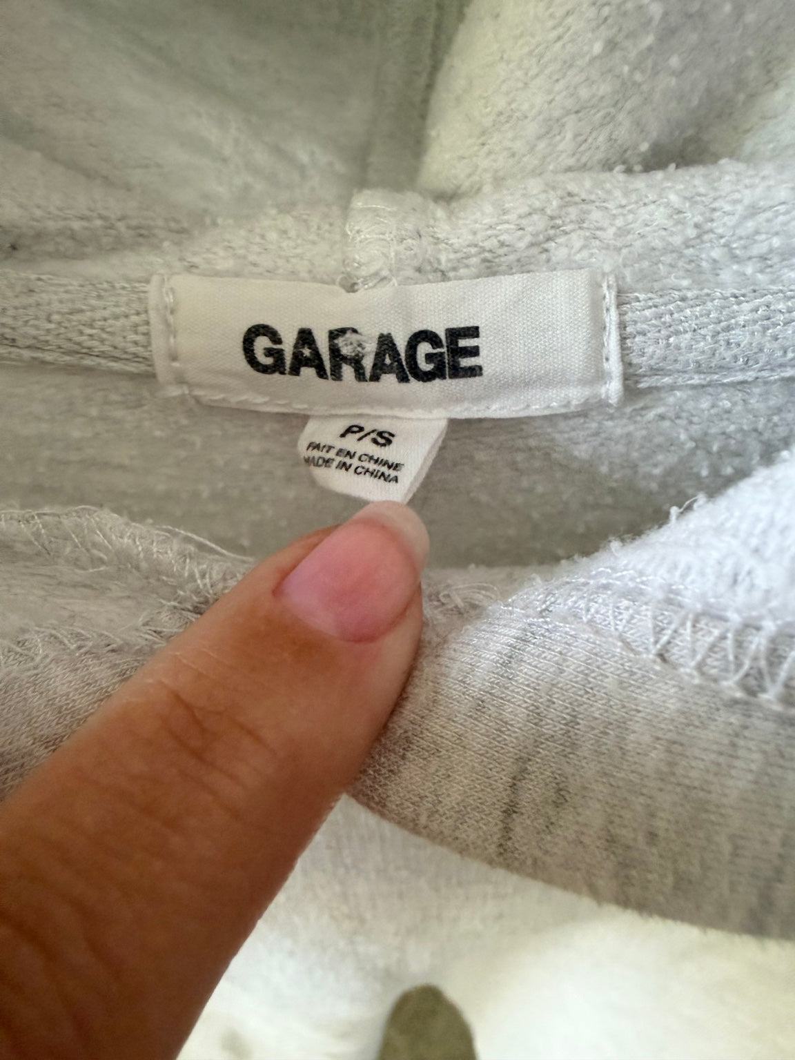 Garage hoodie brand and size detail