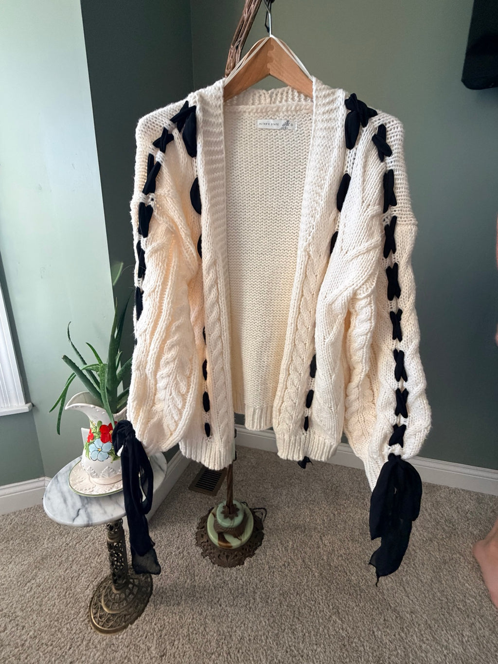 Altar'd State cream cable knit cardigan with black ribbon front