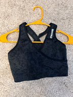 Gymshark black seamless cross-back sports bra size M front