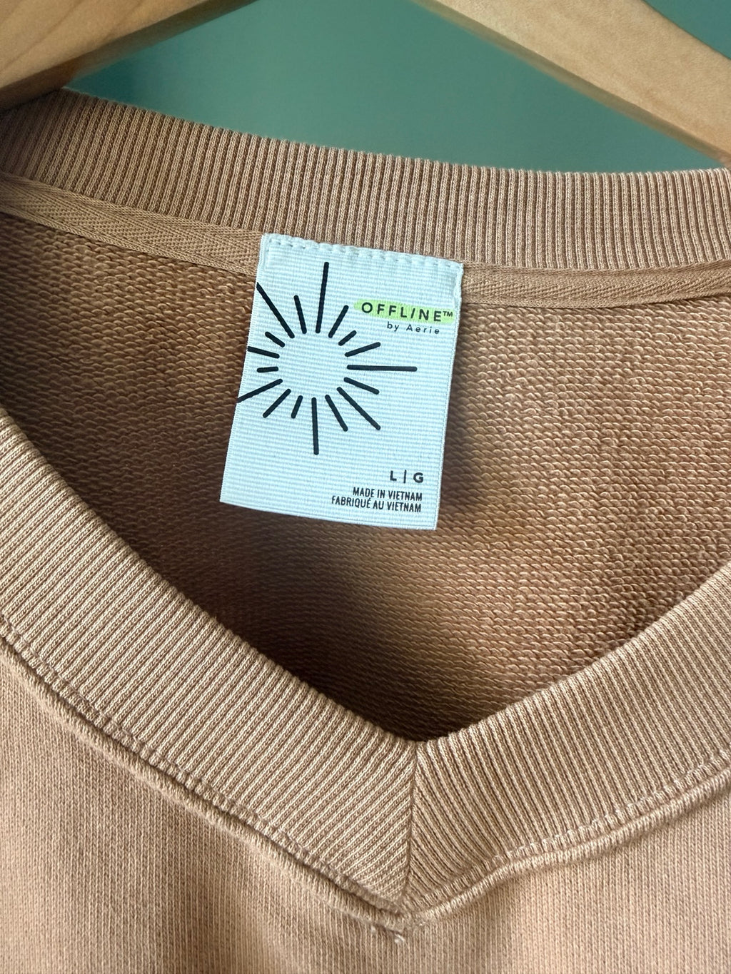 OFFLINE by Aerie sweatshirt brand and size label