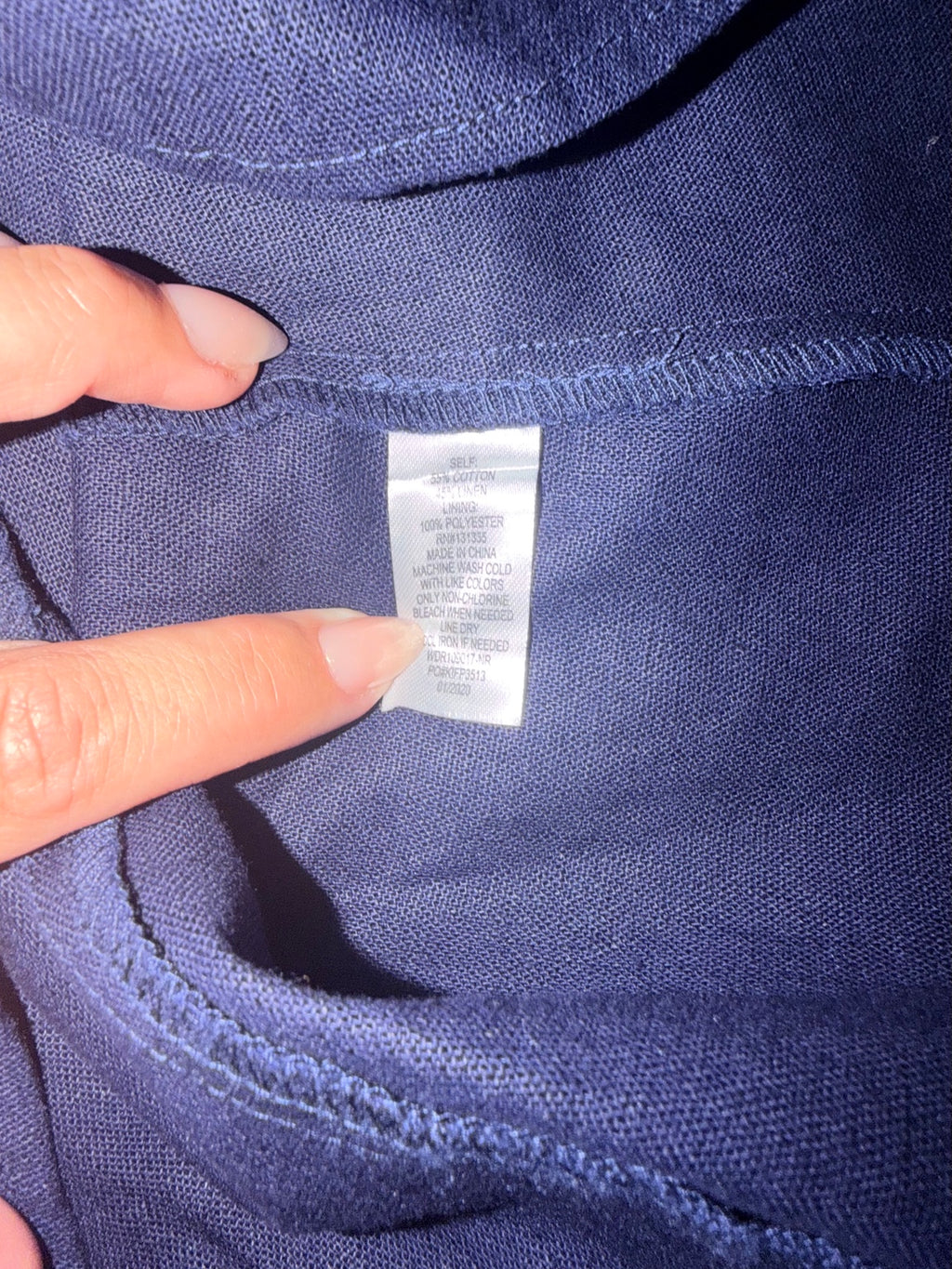 Socialite navy dress fabric and care label